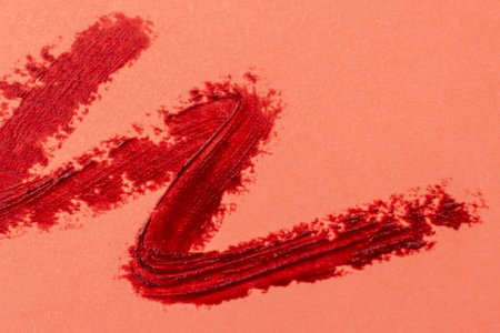 Red lipstick on a red background close-up. Red lipstick.の写真素材
