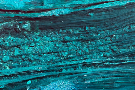 abstract background of blue oil paint on canvas close-up macroの写真素材