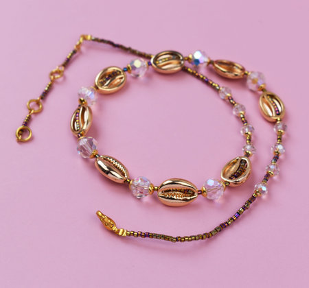 necklace on a pink background close-up, beautiful photo digital picture