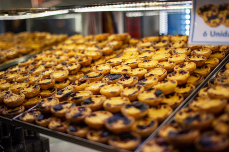 Baked pastry ( pastel de nata  ) for sale at the street food market in Lisbonの写真素材