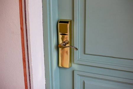 door handle on the door of a house, closeup of photoの写真素材