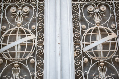 Vintage decorative elements on the facade of an old church, close-up