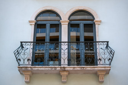Balcony on the facade of a building in the city of Sevillaの写真素材