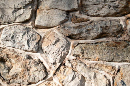 Background of stone wall texture. Closeup of stone wall texture.