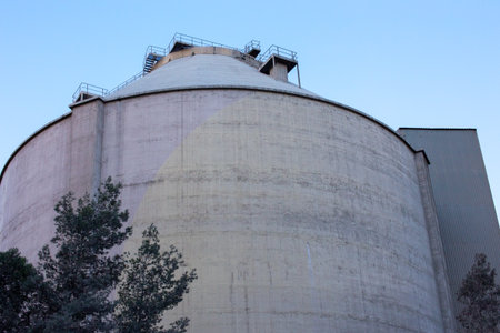 Industrial silos for storing grain in the countryside of Italy.の写真素材
