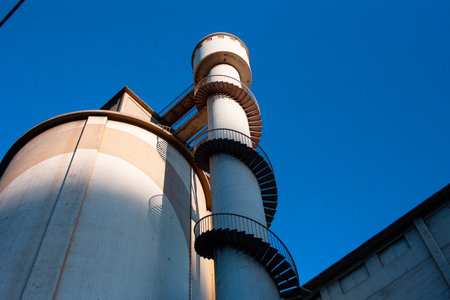 Industrial plant with blue sky in the background, closeup of photoの写真素材