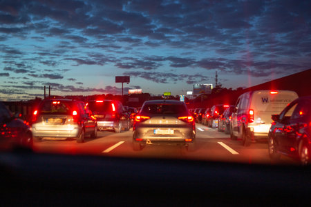 Traffic jam on the highway in the evening. Focus on the car.のeditorial素材