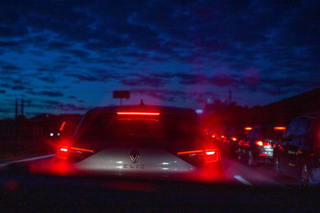 Car on the road at night with traffic jam and lights in the cityのeditorial素材