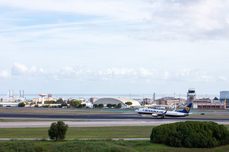 Airplane taking off from Lisbon Airportのeditorial素材