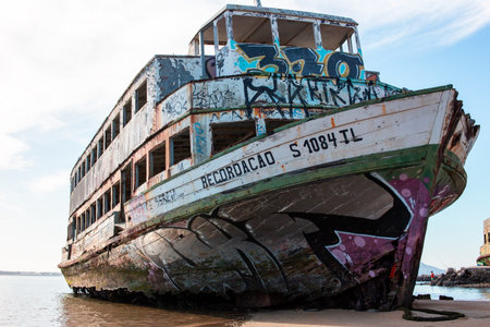 Old rusty ship wreck on the beach in Penang, Malaysia.のeditorial素材