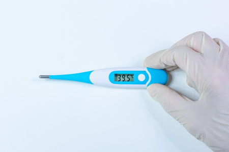 Blue medical thermometer displaying 39.5 ?