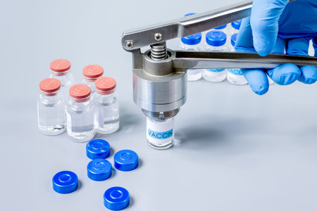 Vaccine vials and crimping pliers for closure