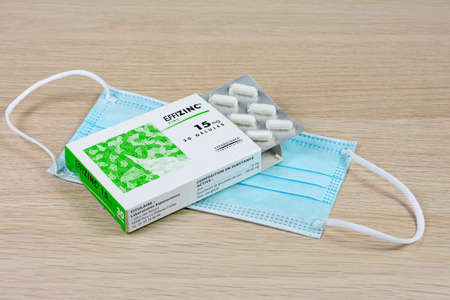 Box of zinc capsules, Effizinc brand, French laboratory, and surgical maskのeditorial素材