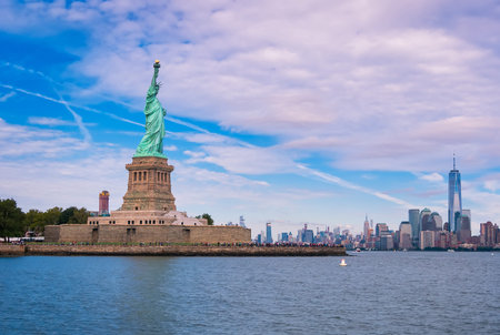 statue of liberty in front of the Manhattan skylines,in New York, USA