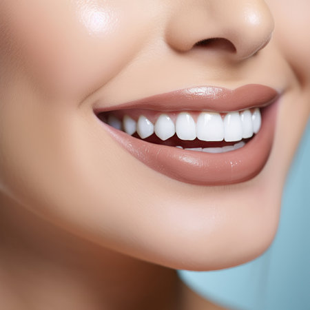 Beautiful woman smile with healthy teeth. Teeth whitening concept.の素材