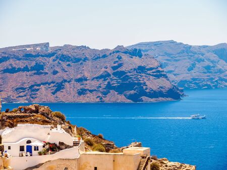 Beautiful cozy traditional white cave house. Amazing Santorini, Cyclades, Greeceの写真素材