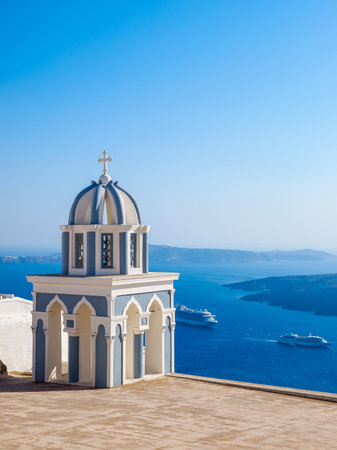 Traditional santorini island architecture of church and amazing sea view. Santorini, Cyclades, Greece.の写真素材