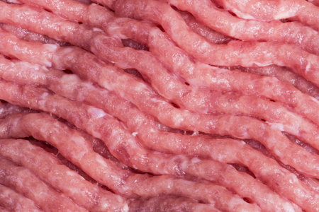fresh raw chopped meat close up horizontal photo.