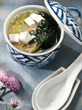 Miso soup, soup based on soybean paste with seaweed and tofu. soup with tofu and seaweed. の写真素材