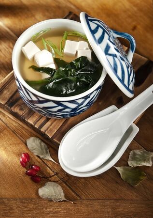 Miso soup, soup based on soybean paste with seaweed and tofu. soup with tofu and seaweed. の写真素材