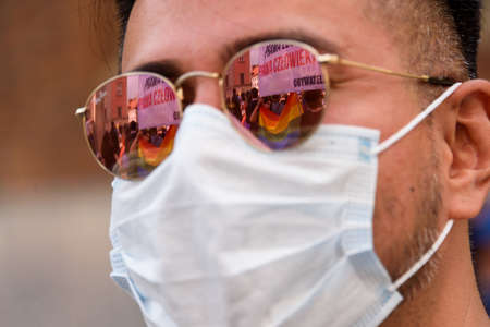 Wroclaw, Poland, 19.06.2020 - polish LGBT peaceful march for equality on glasses reflectionのeditorial素材