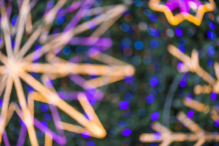 city lights blurred abstract circular bokeh on backgroundの写真素材