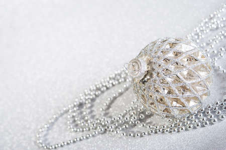 Christmas Festive Vintage decorations on silver glitter background with copy spaceの写真素材