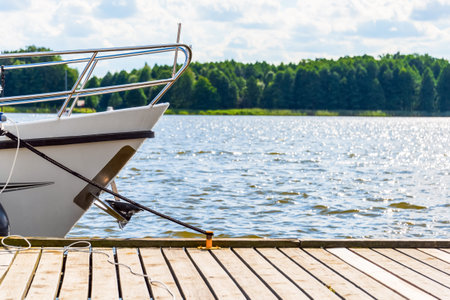 Yachts moored in a harbor. Sailboats in the dock. Summer vacations, cruise, recreation, sport, regatta, leisure activity, service, tourismの写真素材