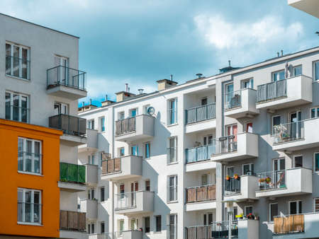 modern apartment building in a city accommodation district. contemporary tenement house and real estateの写真素材