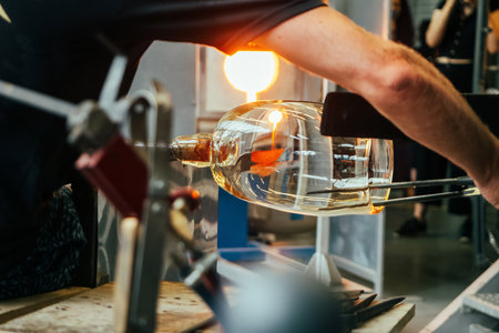 Glass production blowing in traditional industry glass factoryの写真素材