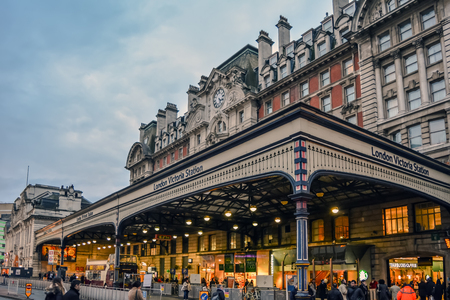 Entrance facade of Victoria station in the City of Westminster shot in the evening. It is a second busiest terminus in Great Britain after Waterloo railway station.のeditorial素材