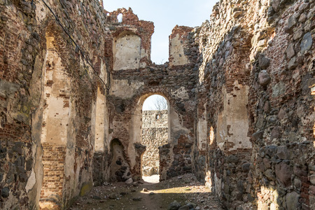 Ruins of Dobele medieval castle built in 1335 by the Livonian order on the abandoned semigallian hillfort. Town of Dobele is located in the historical region of Zemgale in Latvia.の写真素材