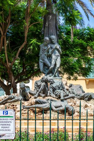 Valletta, Malta - August 30, 2019: Monument dedicated to Dun Mikiel Xerri and his fellow compatriots in Valletta, near his former residence.のeditorial素材