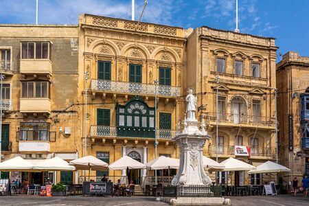 Birgu, Malta - September 1, 2019: Statue of St Lawrence, patron saint of the city, at compact Victory Square in Birgu (Vittoriosa).のeditorial素材