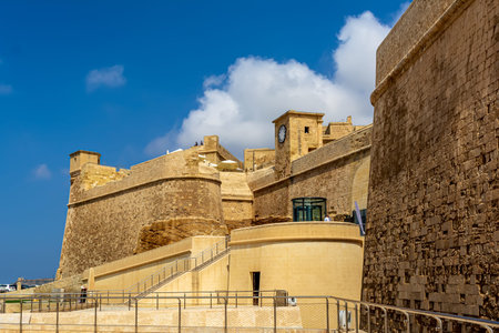 View to the entrance to Cittadella, St. Martin's Demi-Bastion and clock tower.のeditorial素材