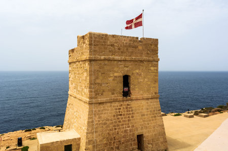 Sciuta Tower, or Wied iÅ¼-Å»urrieq Tower, shot from the land. It is small watchtower in Qrendi,...