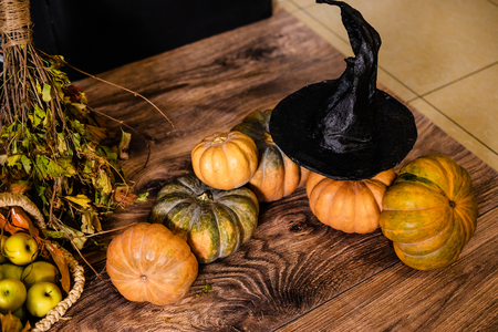 A lot of different pumpkins on the floor for the decor for the celebration of Halloween.の写真素材