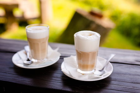 A glass of cappuccino on the terrace. Lithuania, Vilnius districtの写真素材