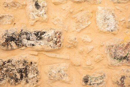 Huge yellow ancient stones of the Wall of Tears with notes between.の写真素材