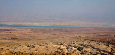 View at coast of the Dead Sea from ruins of high-rise fortress Masada, Israel.の写真素材