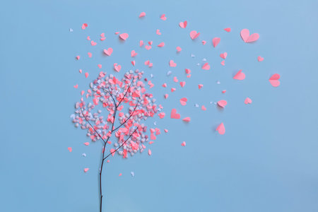 love tree with paper heart leaves on blue background. Concept Valentineの写真素材