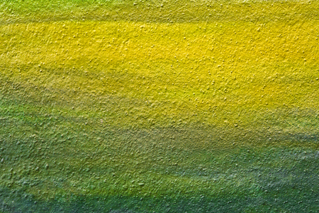 Color yellow-green textured wall.の写真素材