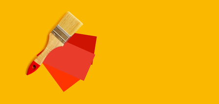 Choice of red color for the walls. Brush and color samples. Copy space.の写真素材