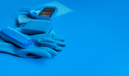 Blue set for spring cleaning in the house. The view from the top. Place for text.の写真素材