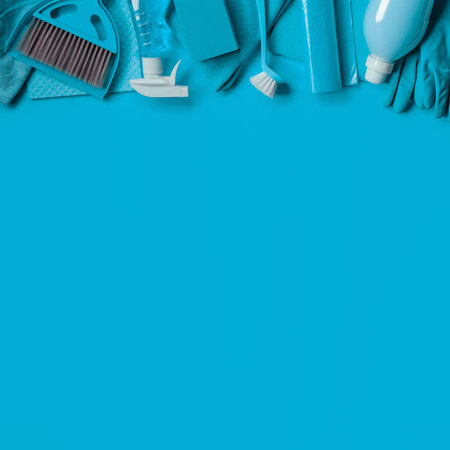Blue cleaning kit for housekeeping. Top view. Copy space.