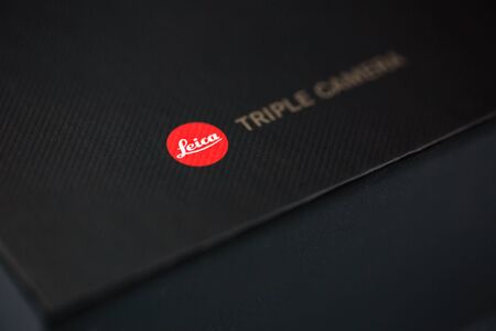 MOSCOW, RUSSIAN FEDERATION - December 24, 2018: Black cardboard packaging Huawei Mate20 Pro. Soft focus.のeditorial素材