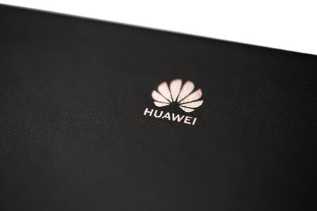 MOSCOW, RUSSIAN FEDERATION - December 24, 2018: Black cardboard packaging Huawei Mate20 Pro. Soft focus.のeditorial素材