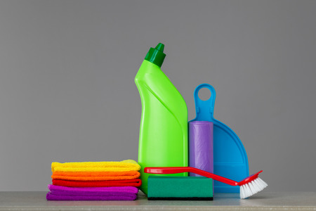 Colorful set of tools for cleaning the house on neutral . The concept of spring cleaning. Copy space.の写真素材