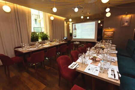 St. Petersburg, Russia-August 16, 2018: hall in the hotel restaurant, prepared for tasting and learning sommelier.のeditorial素材