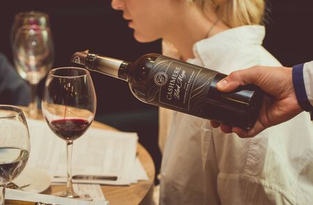 St. Petersburg, Russia-August 16, 2018: Cashmere wine, produced by Cline family Cellars, pouring for tasting at the training.のeditorial素材